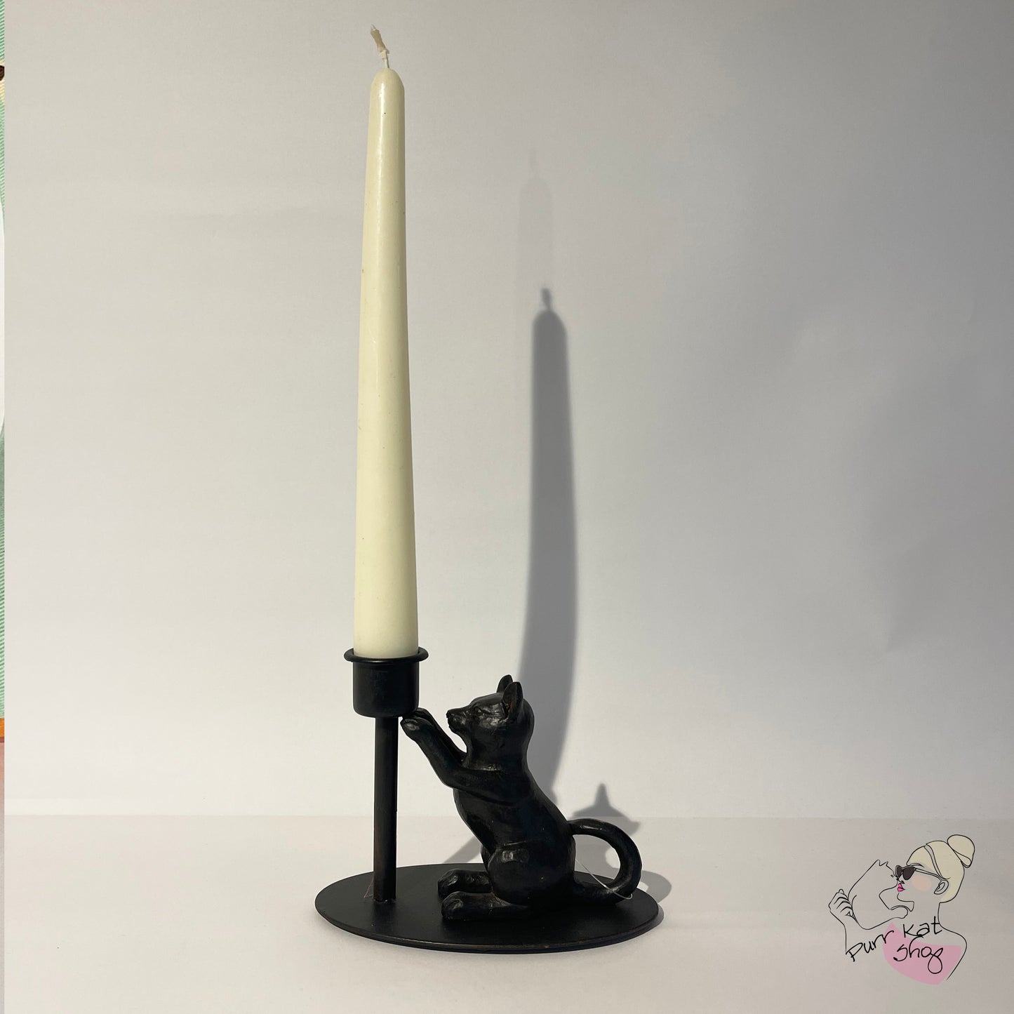 kandelaar zittende kat